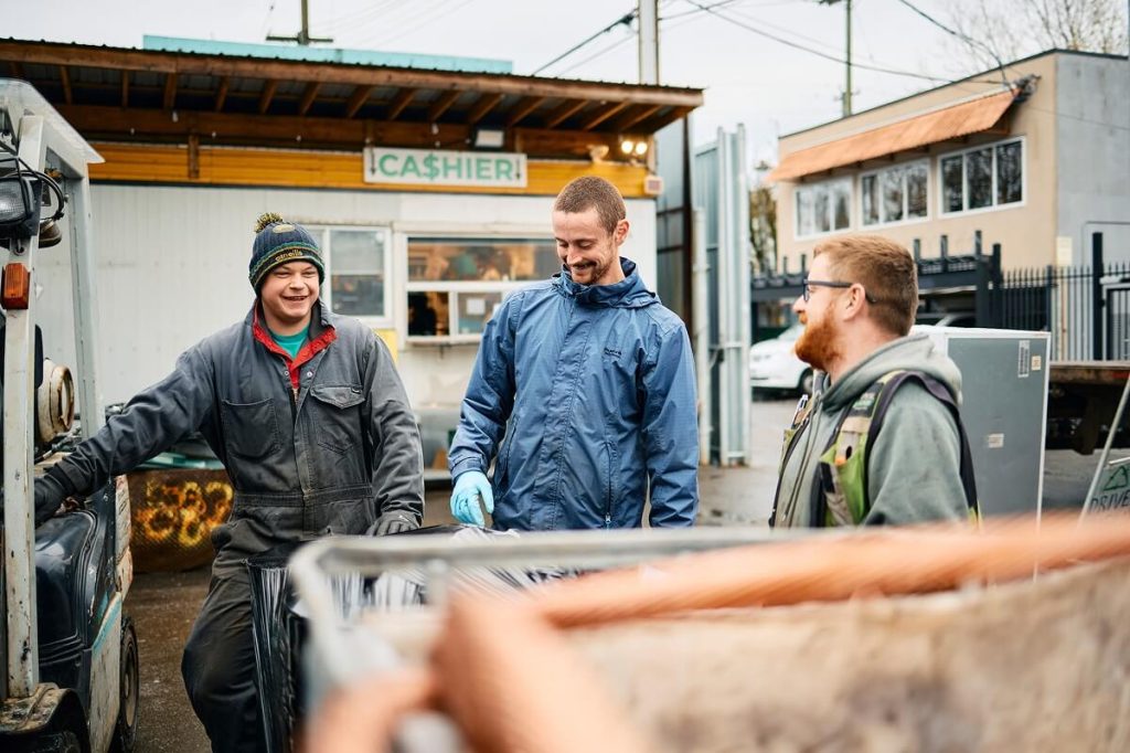 Salvage guys hanging out in the yard