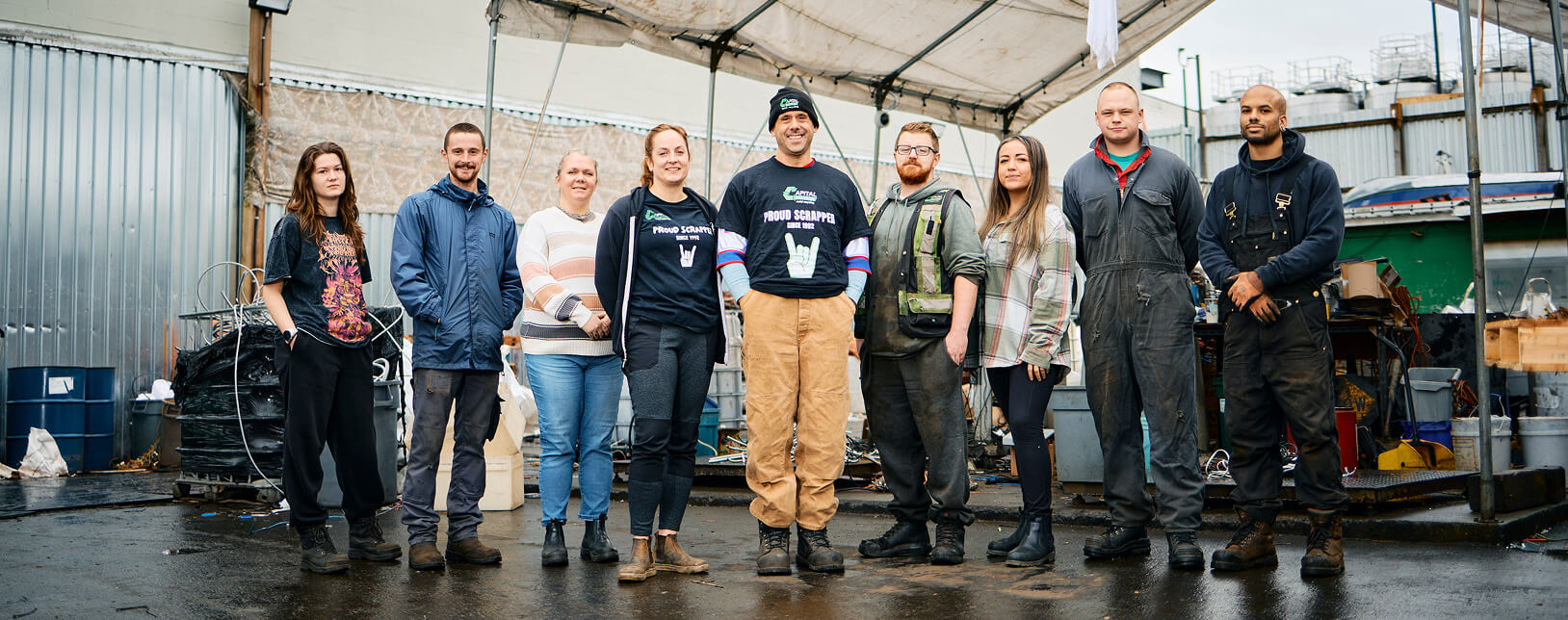 The Capital Salvage team in an epic pose inside the scrap yard